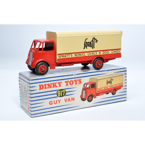 1049 - Dinky No. 917 Guy advertising van, Spratts. Single issue is in red / beige with red hubs, as shown. ... 