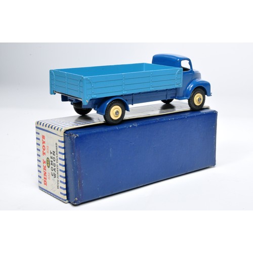 1053 - Dinky No. 932 Leyland Comet Wagon with hinged tailboard. Single issue is in two tone blue, with crea... 