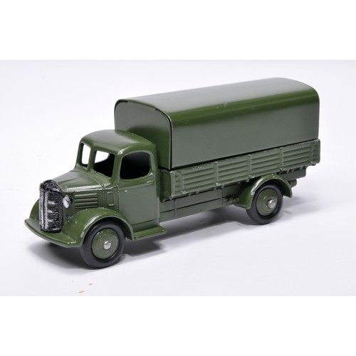 1078 - Dinky Military No. 30SM Austin covered wagon. Displays generally good to very good, with very little... 