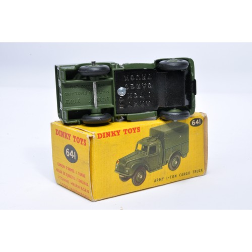 1081 - Dinky Military No. 641 1-ton cargo truck. Displays generally very good to excellent, with very littl... 