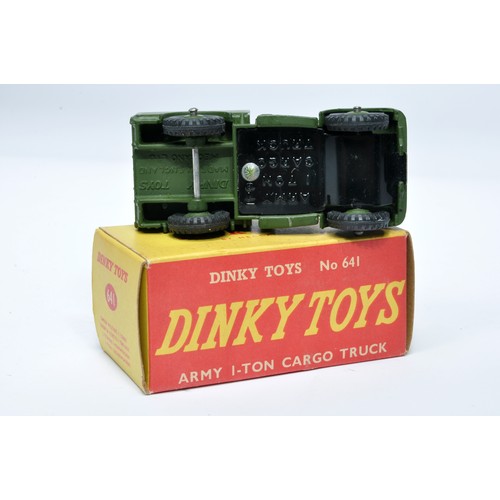 1083 - Dinky Military No. 641 1-ton cargo truck. Displays generally very good to excellent, with very littl... 