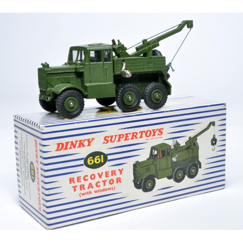 1092 - Dinky Military No. 661 Recovery Tractor with windows. Displays generally very good to excellent, wit... 