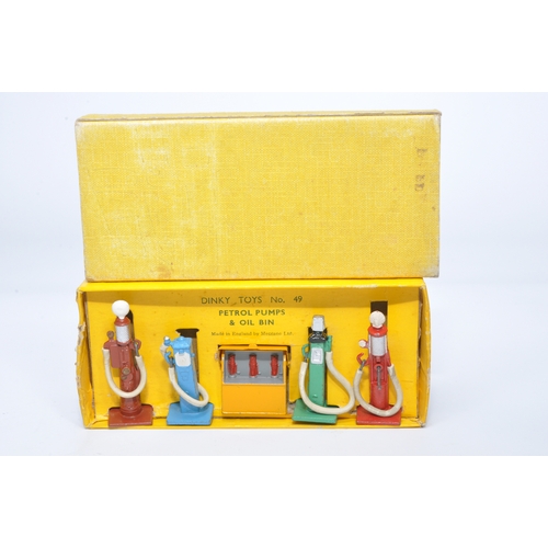 1113 - Dinky early issue set no. 49 petrol pumps. Complete as shown. Displays generally good to very good, ... 