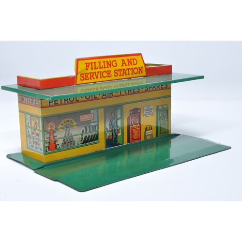 1118 - Dinky early issue set no. 48 tinplate Petrol Station. Displays generally good to very good good, wit... 