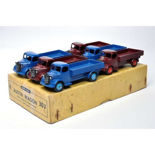 1121 - Dinky Trade Box for No. 30J  x 6 Austin Open Back Wagon. All issues in either blue or maroon, as sho... 