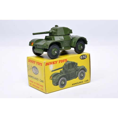 1094 - Dinky Military No. 670 Armoured car. Displays generally very good to excellent, with very little, or... 