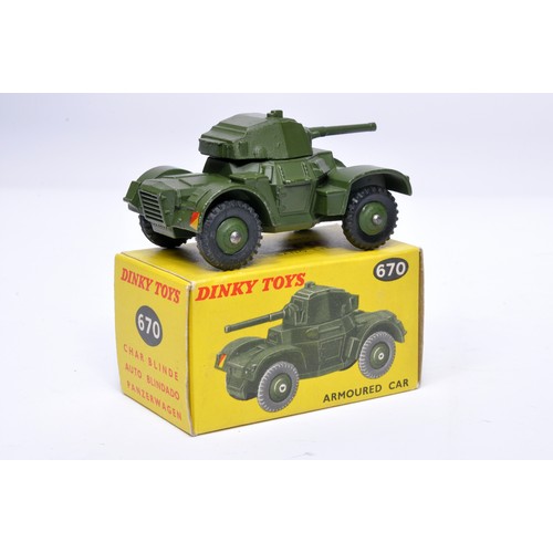 1094 - Dinky Military No. 670 Armoured car. Displays generally very good to excellent, with very little, or... 