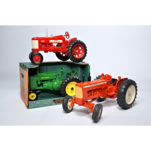 1 - A trio of 1/16 diecast model farm tractors including Allis Chalmers, Farmall and Boxed Ertl John Dee... 