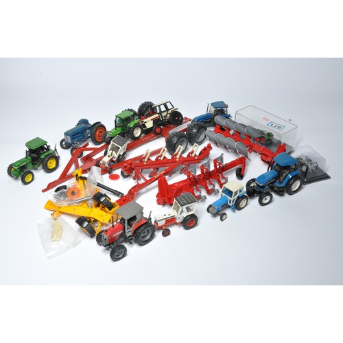 62 - A large assortment of various farm toys and models including loose issues from Britains, Ertl and ot... 