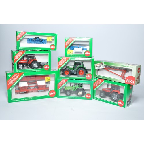 63 - An assortment of Siku 1/32 diecast farm model issues to include both tractor and implements as shown... 