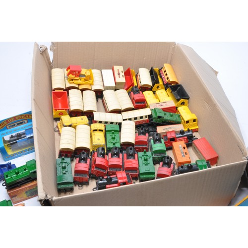 593 - A collection of Matchbox Railway diecast issues including boxed and carded items, loose track and a ... 