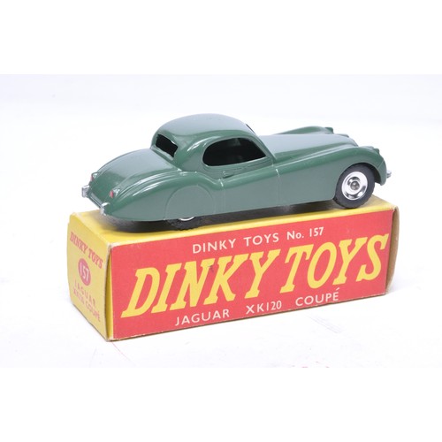 811 - Dinky No. 157 Jaguar XK120 Coupe. Single issue is in fark green, with chrome hubs, as shown. Display... 