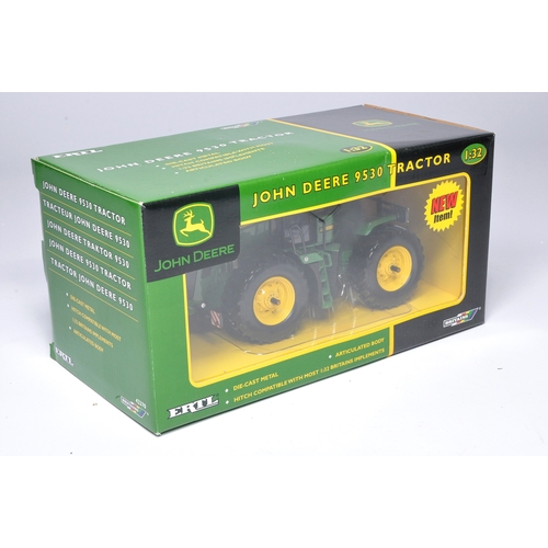 123 - Britains 1/32 Farm model issue comprising John Deere 9530 Tractor. Excellent and secure in box.