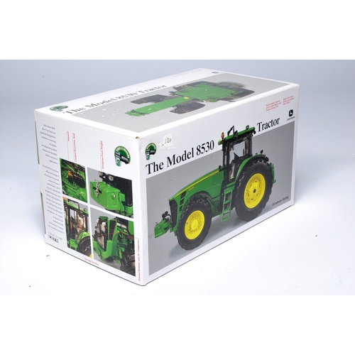 124 - Britains 1/32 Farm model issue comprising John Deere 8530 Tractor. Precision Series. Excellent and s... 
