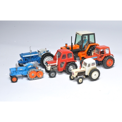 89 - Assorted Tractor models from various makers including Britains, Dinky and Corgi. Mostly display very... 