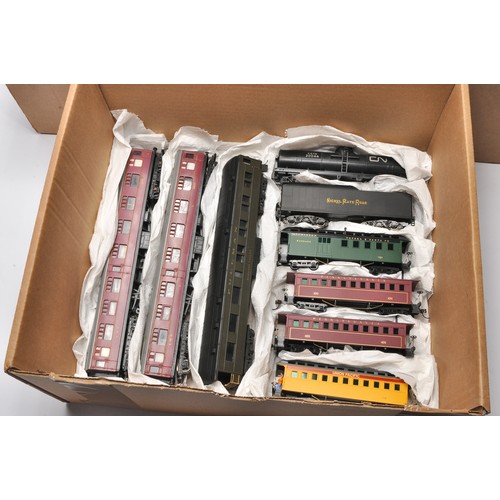 43 - Model Railway comprising a large assortment of rolling stock - coaches / wagons from various makers,... 