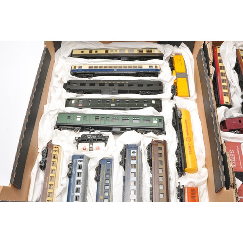 45 - Model Railway comprising a large assortment of rolling stock - coaches / wagons from various makers,... 