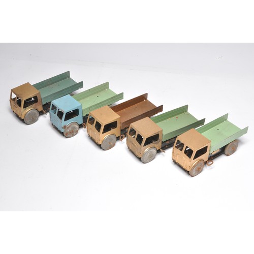 161 - A group of unusual tin/metal Foden type mechanical clockwork tipper lorry issues in various colours,... 