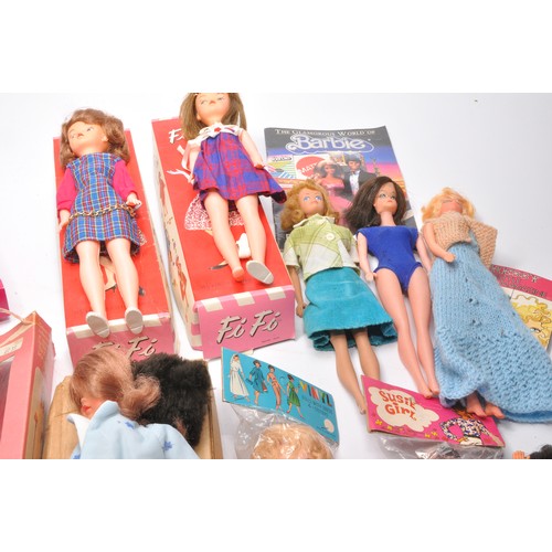 167 - An interesting collection of fashion dolls to include vintage Barbie, Sindy and Fi Fi, plus some HK ... 