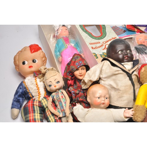 170 - A collection of vintage dolls to include large boxed Chinese national doll plus some early compositi... 