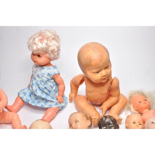 171 - A large group of vintage dolls, mostly 1960/70's.