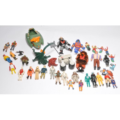 186 - An interesting group of mostly 1980's action figures including Masters of the Universe, A-Team, Star... 