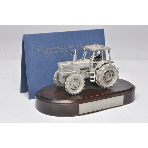 200 - Pewter Ford TW-35 Tractor mounted on a wooden plinth marked Basildon Tractor Production 1984-1989. P... 