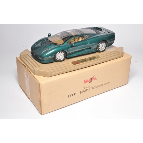 348 - Maisto 1/12 diecast Jaguar XJ220, in green. Looks excellent in original box.