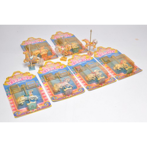 351 - A group of 9 Matchbox Carousel Horses, some carded, as shown. Some have been opened.