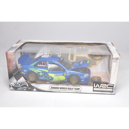 352 - Hot Wheels 1/18 diecast model car issue comprising Subaru World Rally Team WRC Impreza. Looks to be ... 