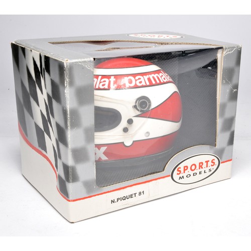 393 - SPORTS Europe replica racing helmet featuring N Piquet. In original box.