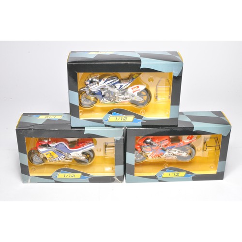 468 - A trio of classic racing 1/12 diecast model motorcycles from IXO comprising riders Doohan, Mamola an... 