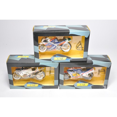 467 - A trio of classic racing 1/12 diecast model motorcycles from IXO comprising riders Spencer, Gardner ... 