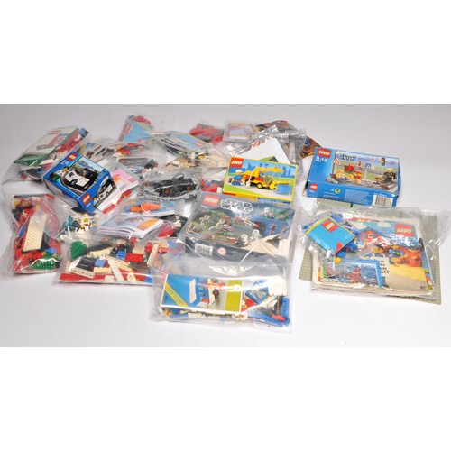 448 - A collection of Lego bagged small kits with instructions, some boxed including Star Wars 9489 and Le... 