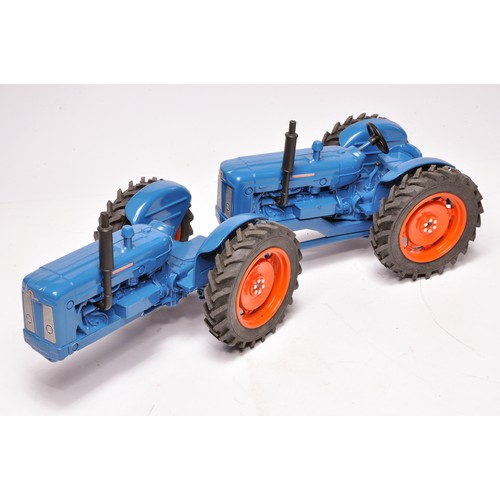 103 - Ertl Code 3 farm model issue comprising 1/16 Doe Triple-D Tractor, slight repair required, otherwise... 