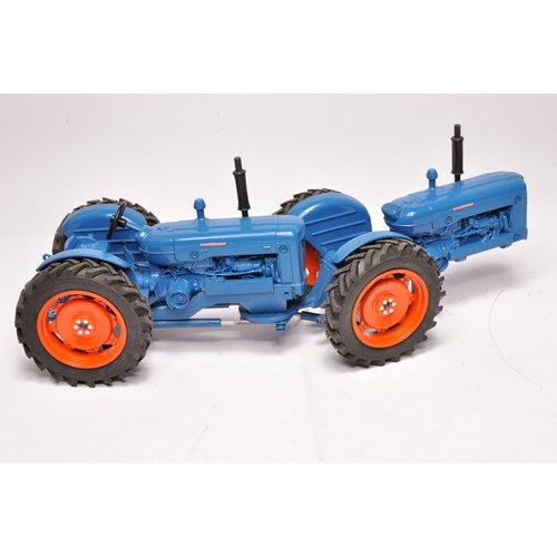 103 - Ertl Code 3 farm model issue comprising 1/16 Doe Triple-D Tractor, slight repair required, otherwise... 