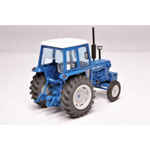 243 - Denis Goodburn 1/32 hand-built farm model issue comprising a Ford 7600 Tractor. Displays with no obv... 