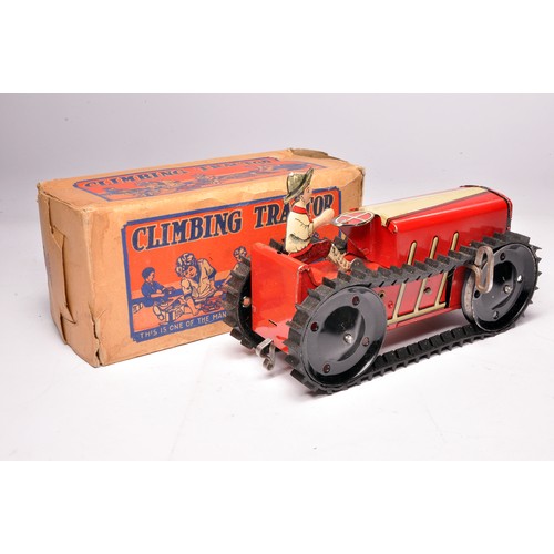 272 - Marx (USA) mechanical pressed metal crawler tractor (with driver). Displays generally very good to e... 