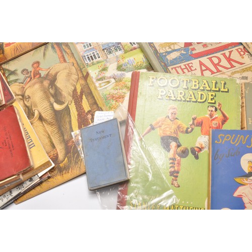 33 - An assortment of vintage book and children's publications including attractive pop-up books, annuals... 