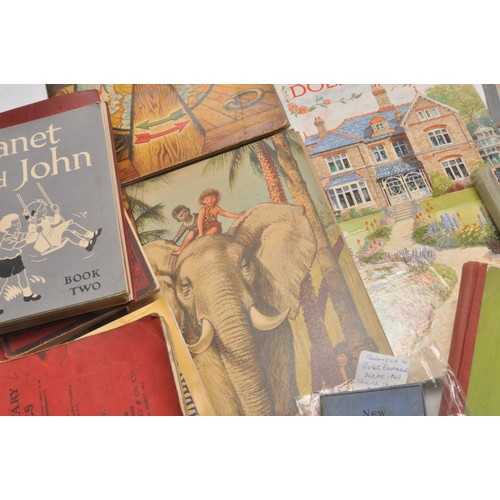 33 - An assortment of vintage book and children's publications including attractive pop-up books, annuals... 