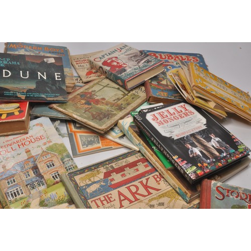 33 - An assortment of vintage book and children's publications including attractive pop-up books, annuals... 