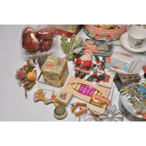 34 - An attractive collection of vintage Christmas decorations and related items, as shown. Many pieces u... 