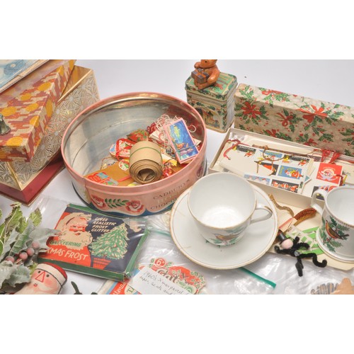 34 - An attractive collection of vintage Christmas decorations and related items, as shown. Many pieces u... 