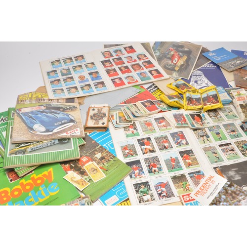 35 - A collection of sporting collectables including a large quantity of unused football stickers (late 6... 