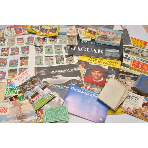 35 - A collection of sporting collectables including a large quantity of unused football stickers (late 6... 