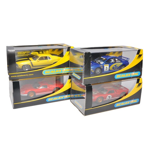 454 - Scalextric slot car issues comprising Subaru Impreza WRC, Ford GT MKH, 1966 Le Mans, Ford GT40 MK II... 