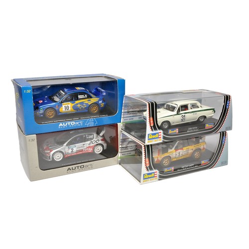 466 - Slot car issues comprising a duo of Autoart - Peugeot 206 WRC 2002, Subaru Impreza WRC 2002 Rallye M... 