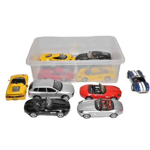 582 - A group of 1/18 diecast model cars from various makers. As shown. Not checked for absolute completen... 