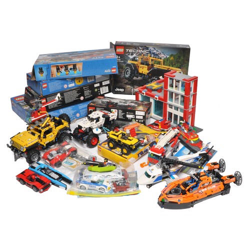 A large collection of mostly assembled Lego Sets, many with original ...