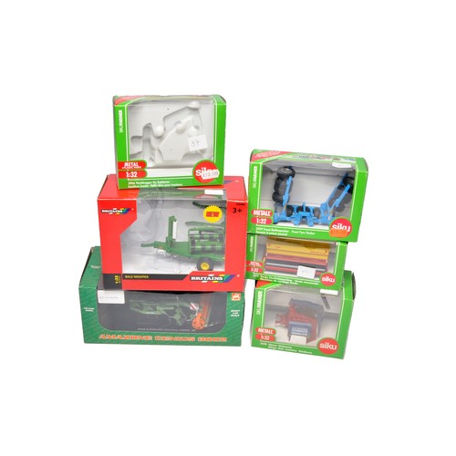 57 - A selection of 1/32 farm models comprising various implements, mostly from Siku and Britains but als... 